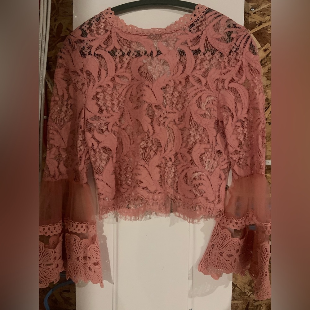 Brand new with lace set. Pencil skirt snd long sleeves lace top /shirt.